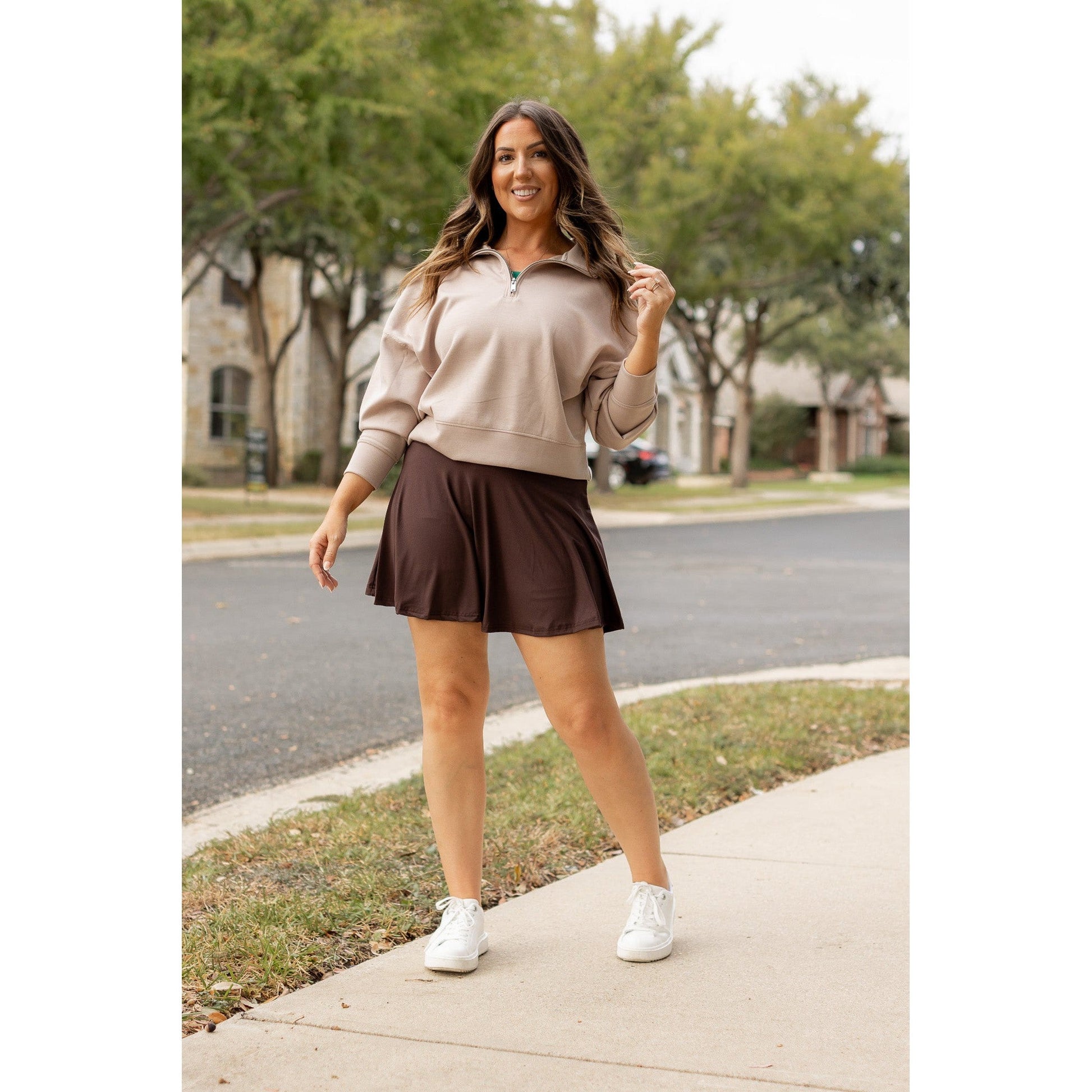 Stretchy brown Julia Rose skort styled for casual wear