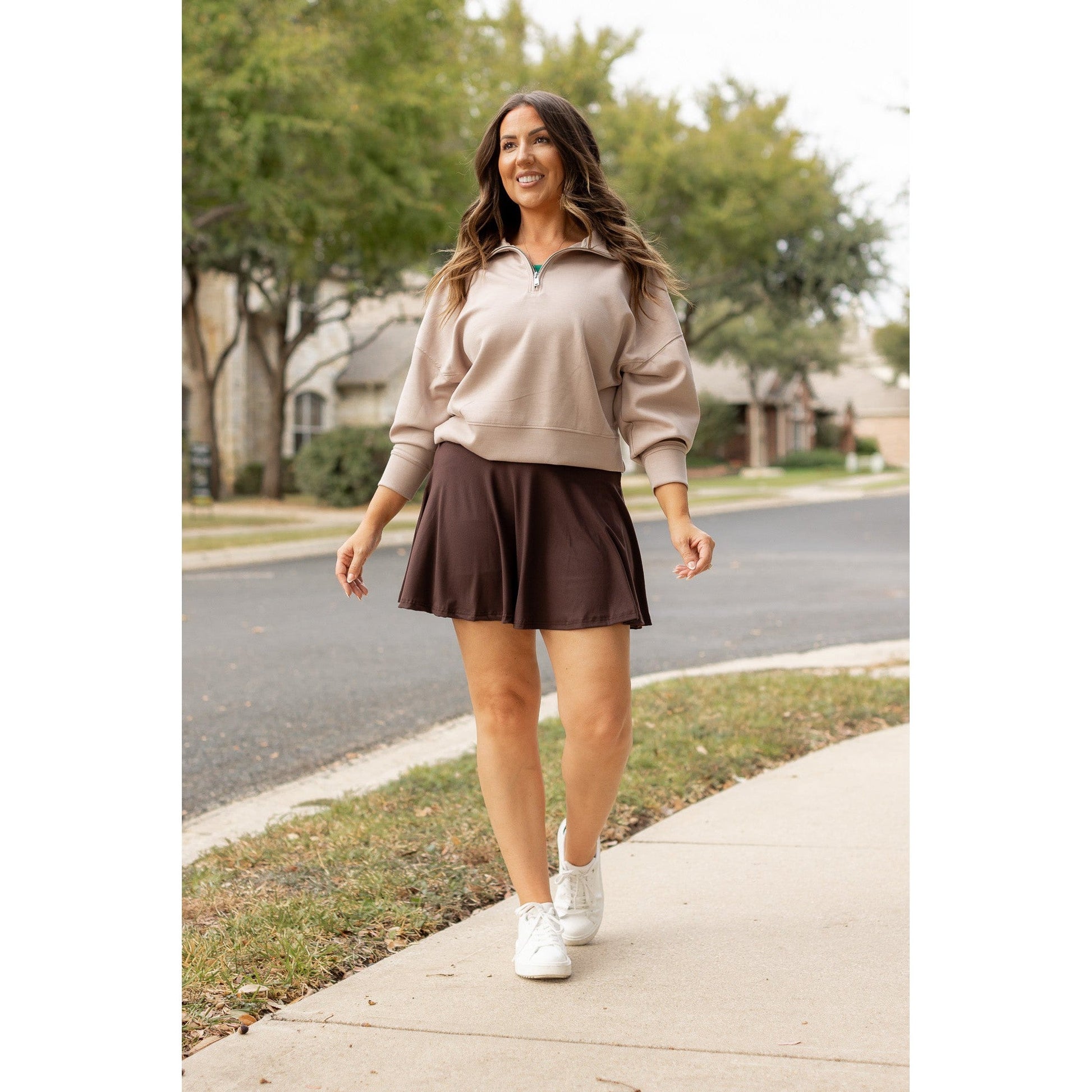 Stretchy brown Julia Rose skort styled for casual wear