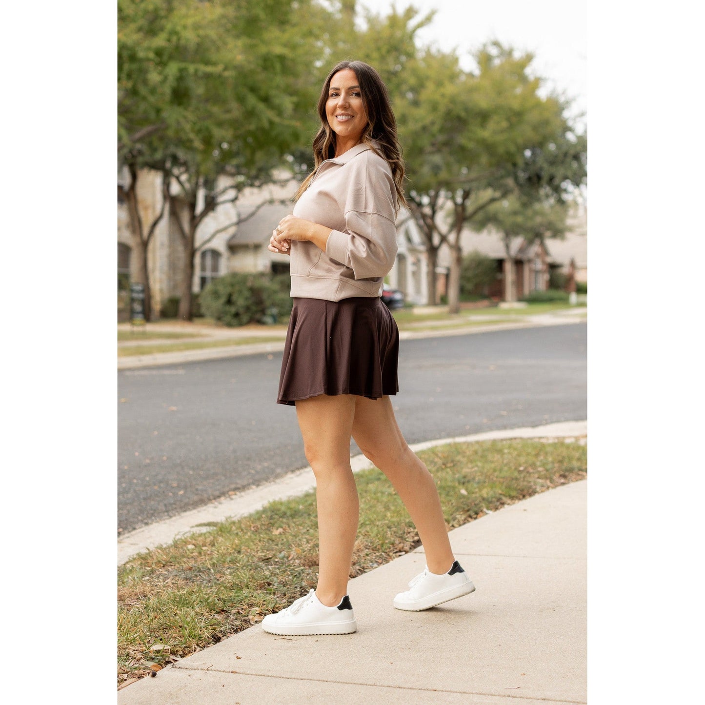 Stretchy brown Julia Rose skort styled for casual wear